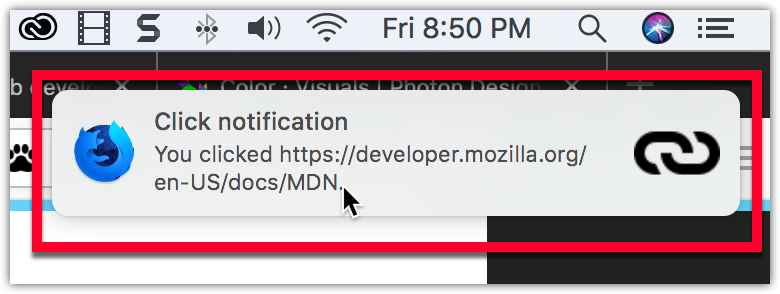 Example notification on macOS, located below the system clock, with a bold title reading "Click notification" followed by regular text reading "You clicked https://mdn.org.cn/en-US/docs/MDN". The notification has the Firefox Nightly logo on the left side, and a link icon on the right.